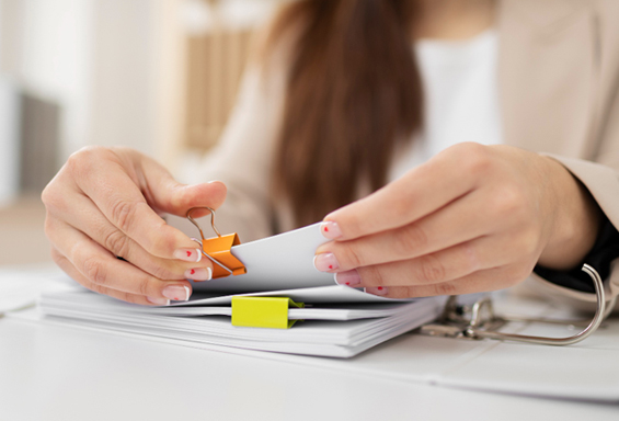 Employees reviewing hr compliance and payroll compliance procedures